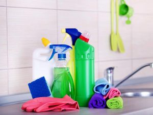 a variety of colorful cleaning supplies